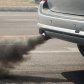 Capacity and emission evaluation of new interchange designs using microsimulation